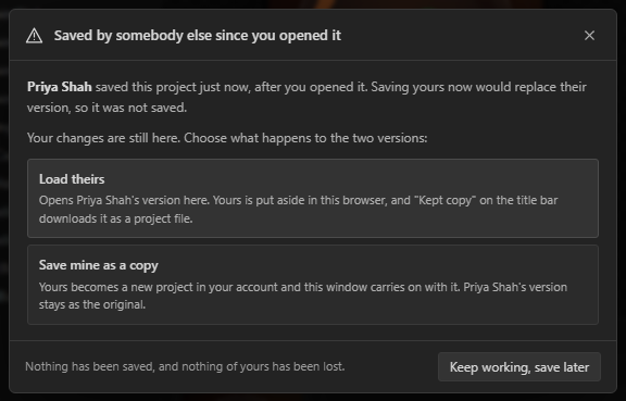 The dialog shown when changes made while away no longer fit: it offers Load theirs or Save mine as a copy.
