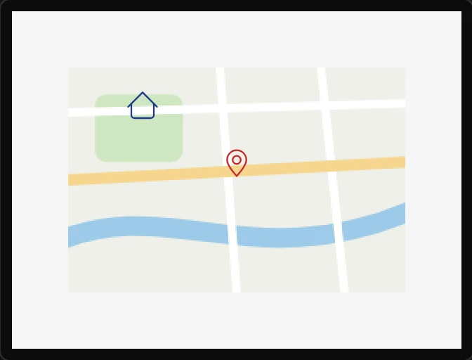 A map of a made-up town with roads, a park and a river, a red pin marker in the middle and a blue house marker by the park.