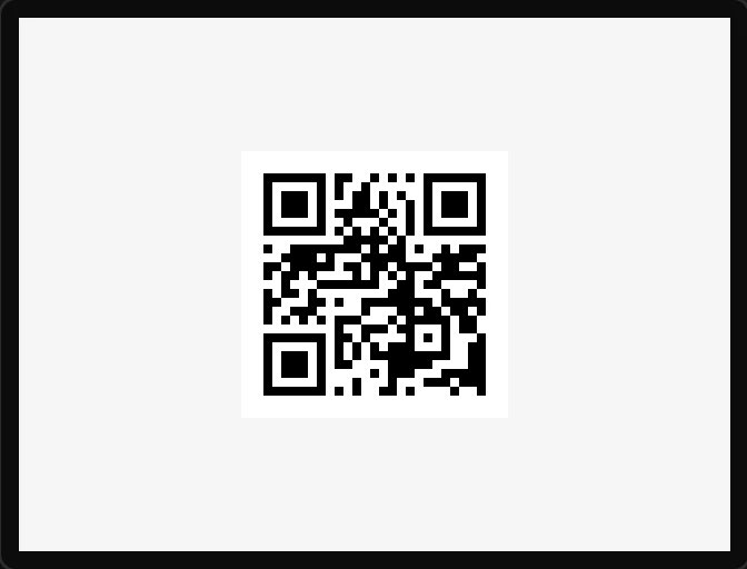 A dropped QR code: a black and white square code on a white box.